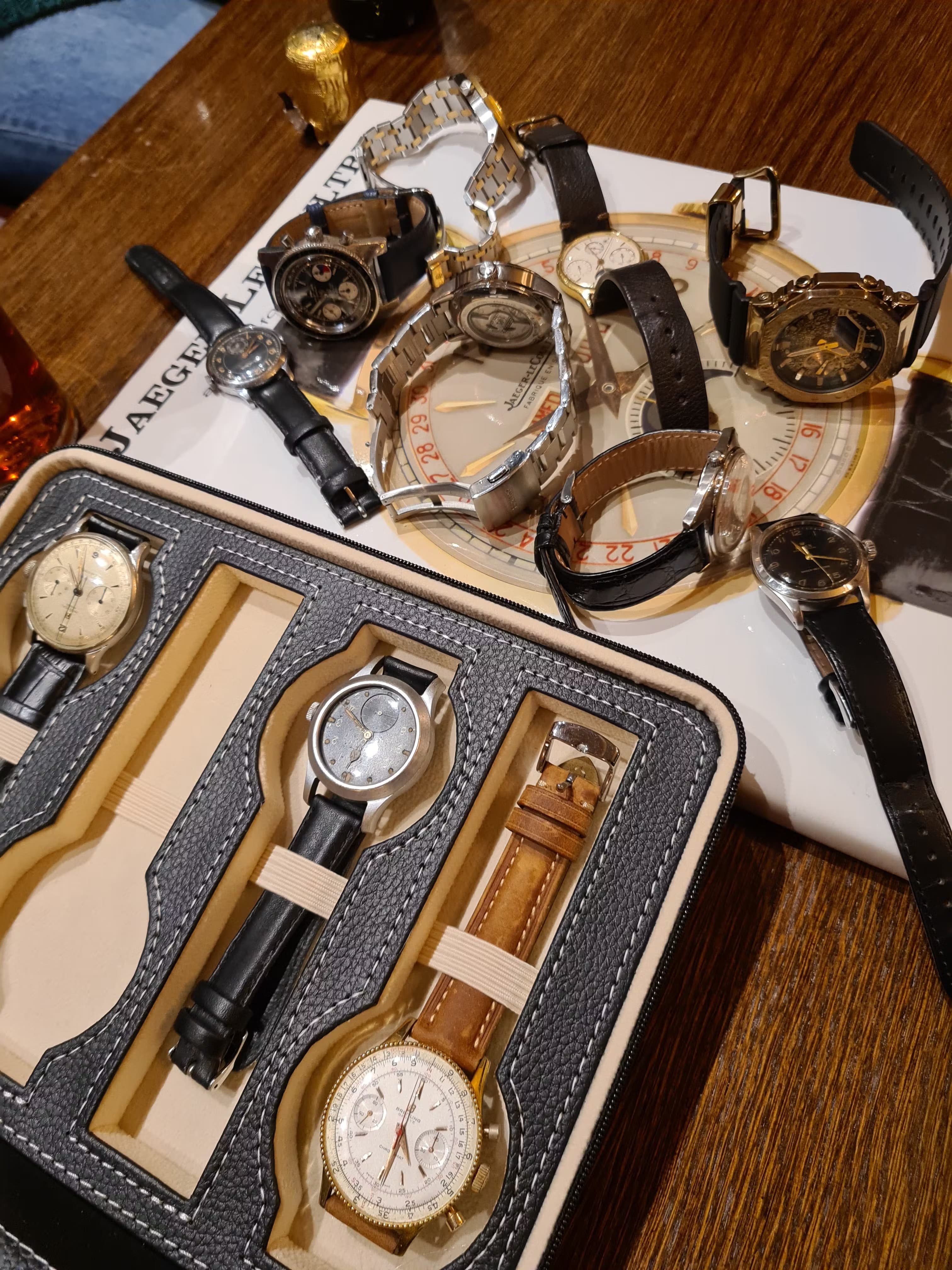 Group of watches brought along to a Watch Club Meetup in a Pub