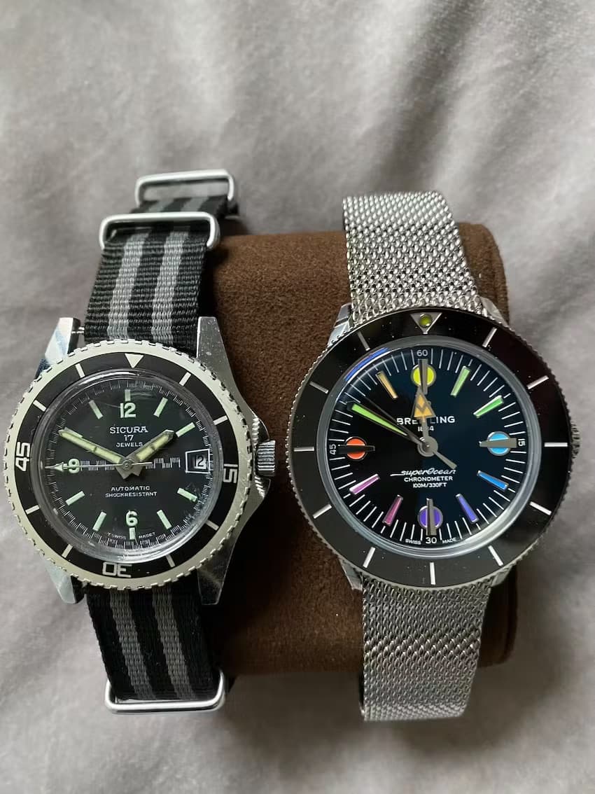 Notice the size difference between the vintage Sicura on the left, and the Modern Breitling on the right